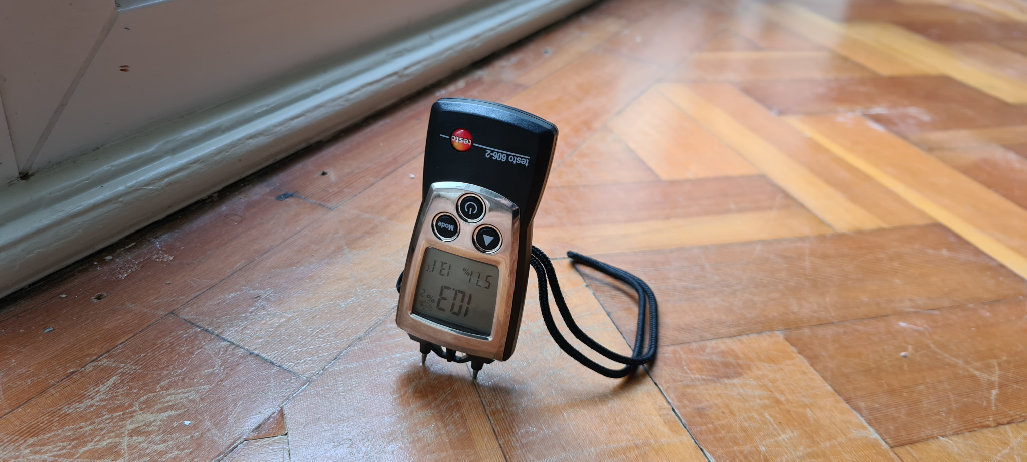 The Ultimate Guide to Choosing the Right Flooring for Every Room Professional moisture testing on a wood subfloor before installation