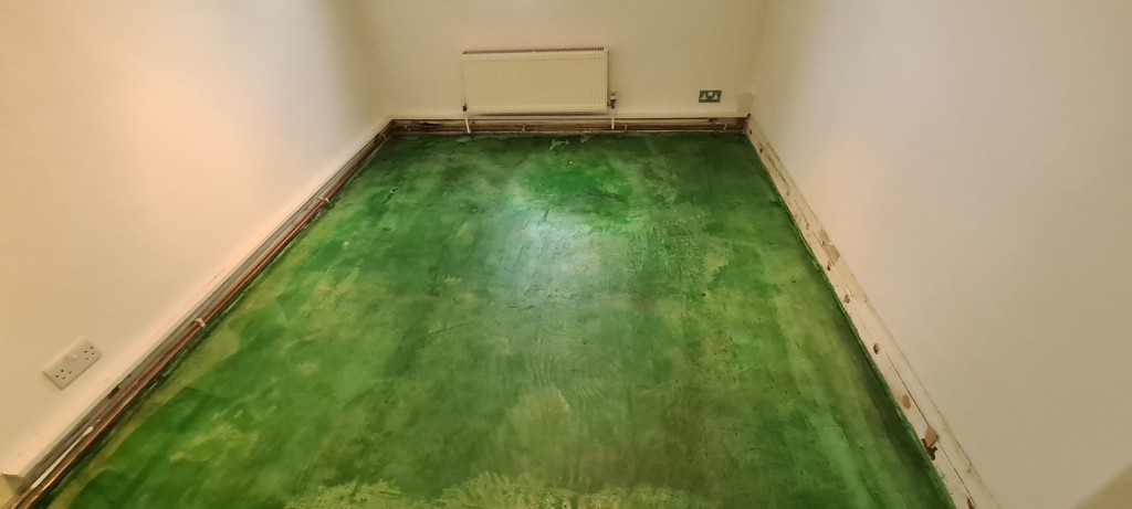 Priming Subfloor Prior to Parquet Flooring Installation