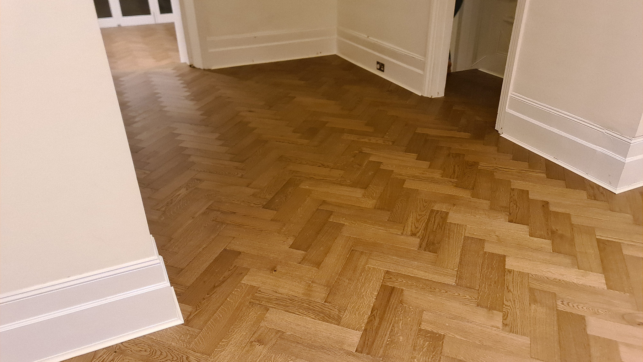 Replacement of Oak Planks with Herringbone Parquet Flooring in Battersea, SW11