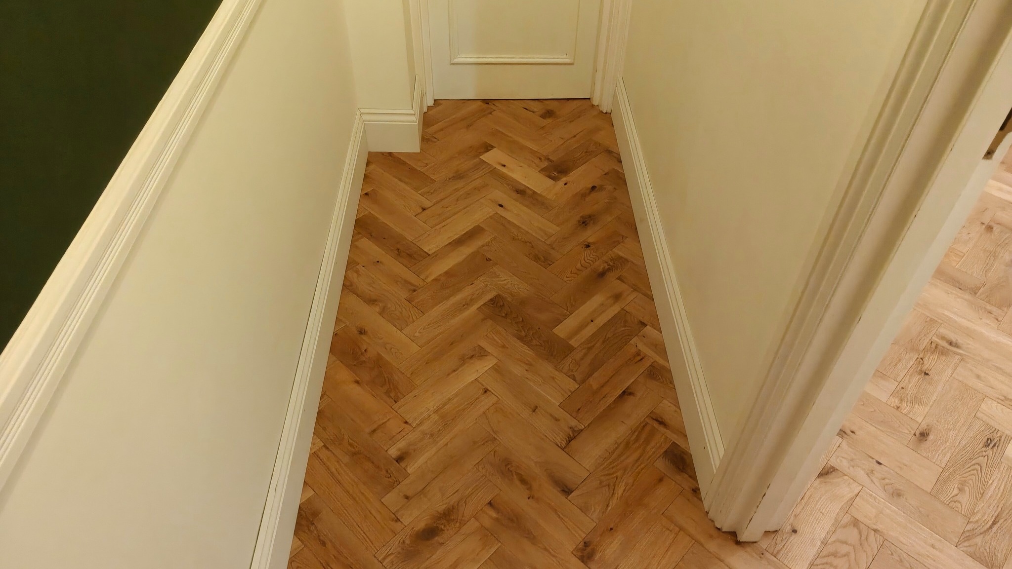 Solid Oak Herringbone Parquet Flooring Fitting - Clapham