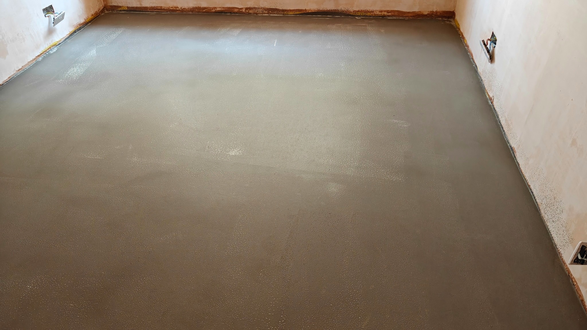 Application of smoothing compound - Leytonstone
