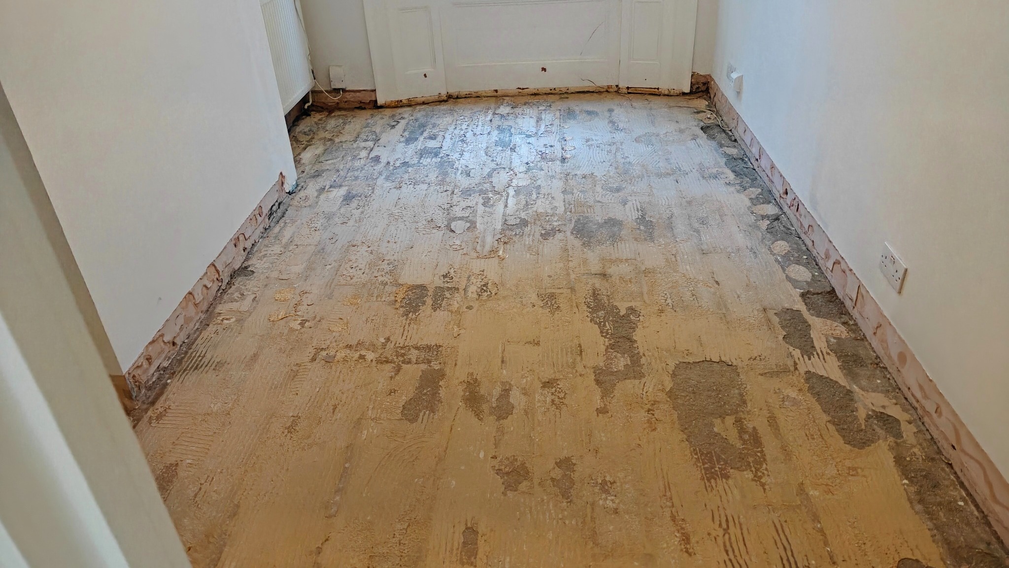 Previous glued-down flooring removed - Islington