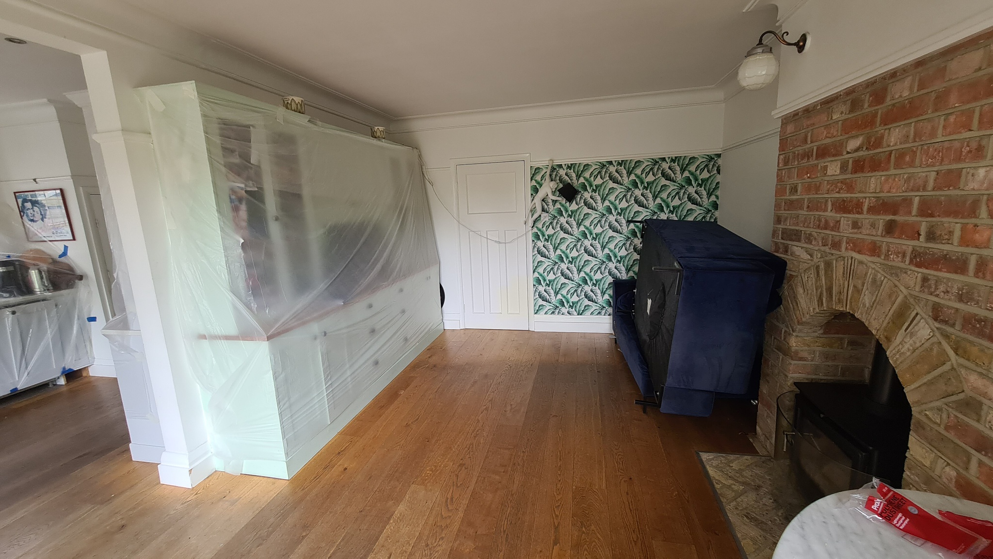 Before the restoration of engineered wood floors - Ealing