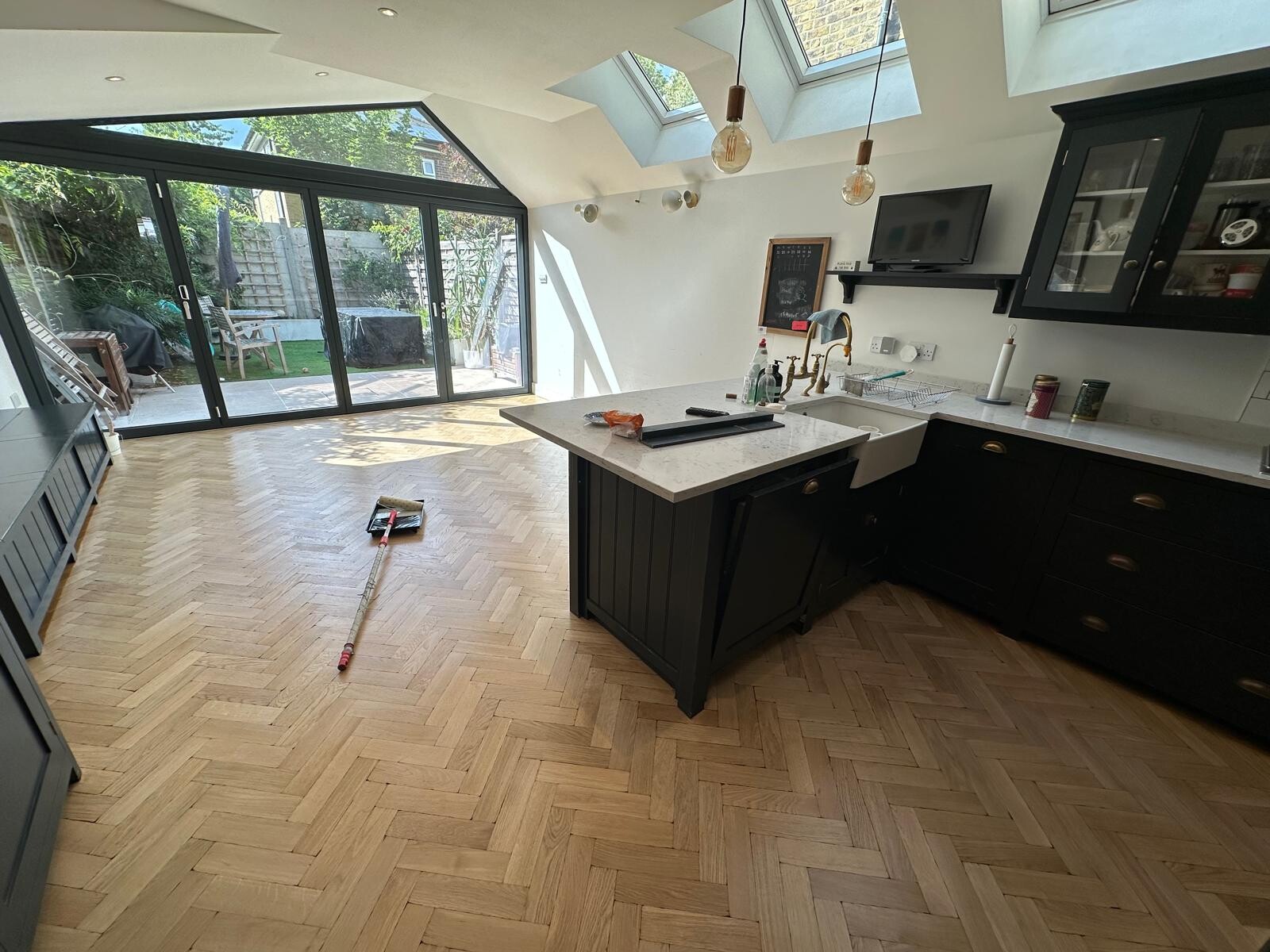 Preparing to seal the parquet flooring - East Dulwich