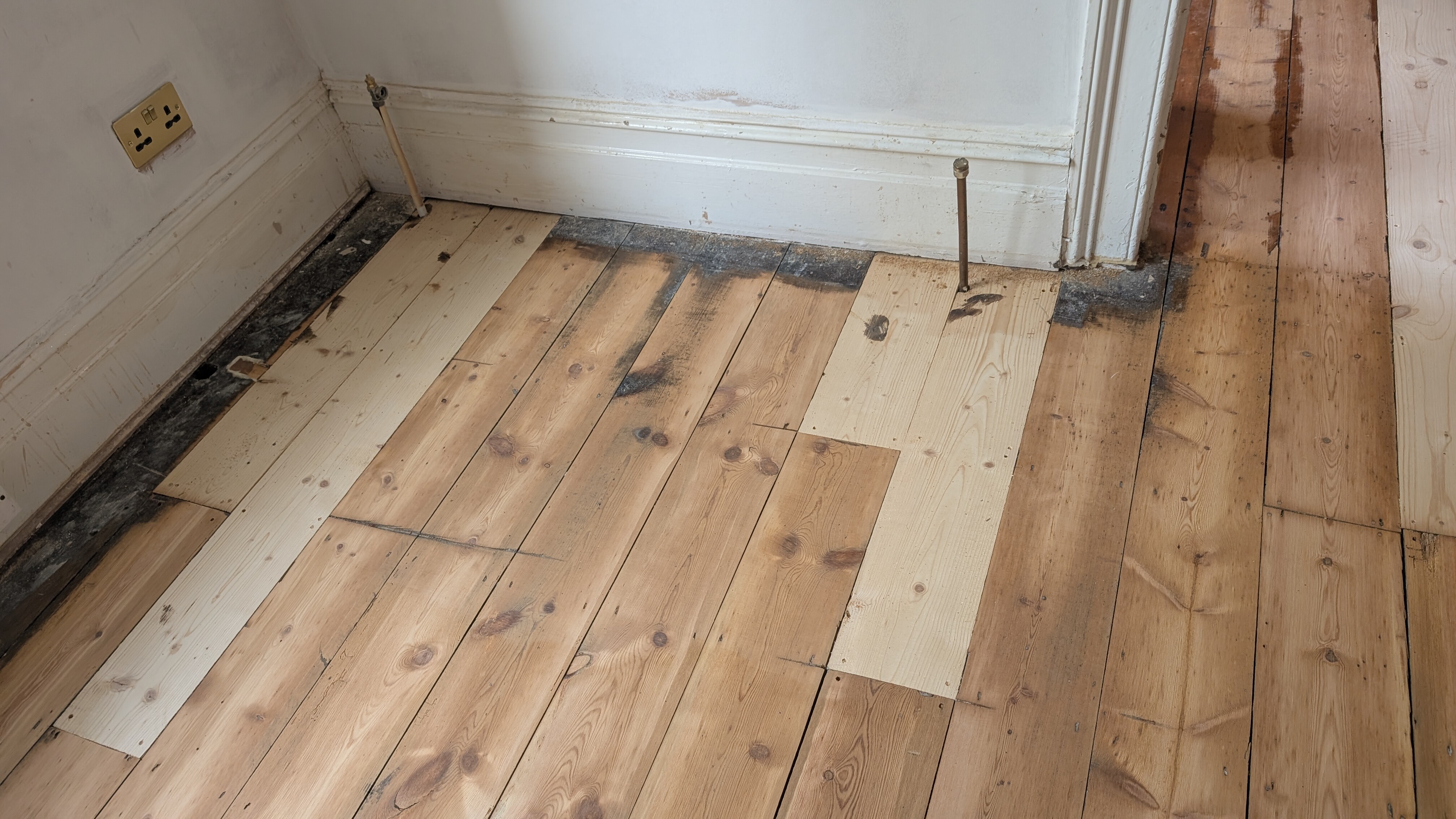 Before the Restoration of Original Pine Floorboards - Watford