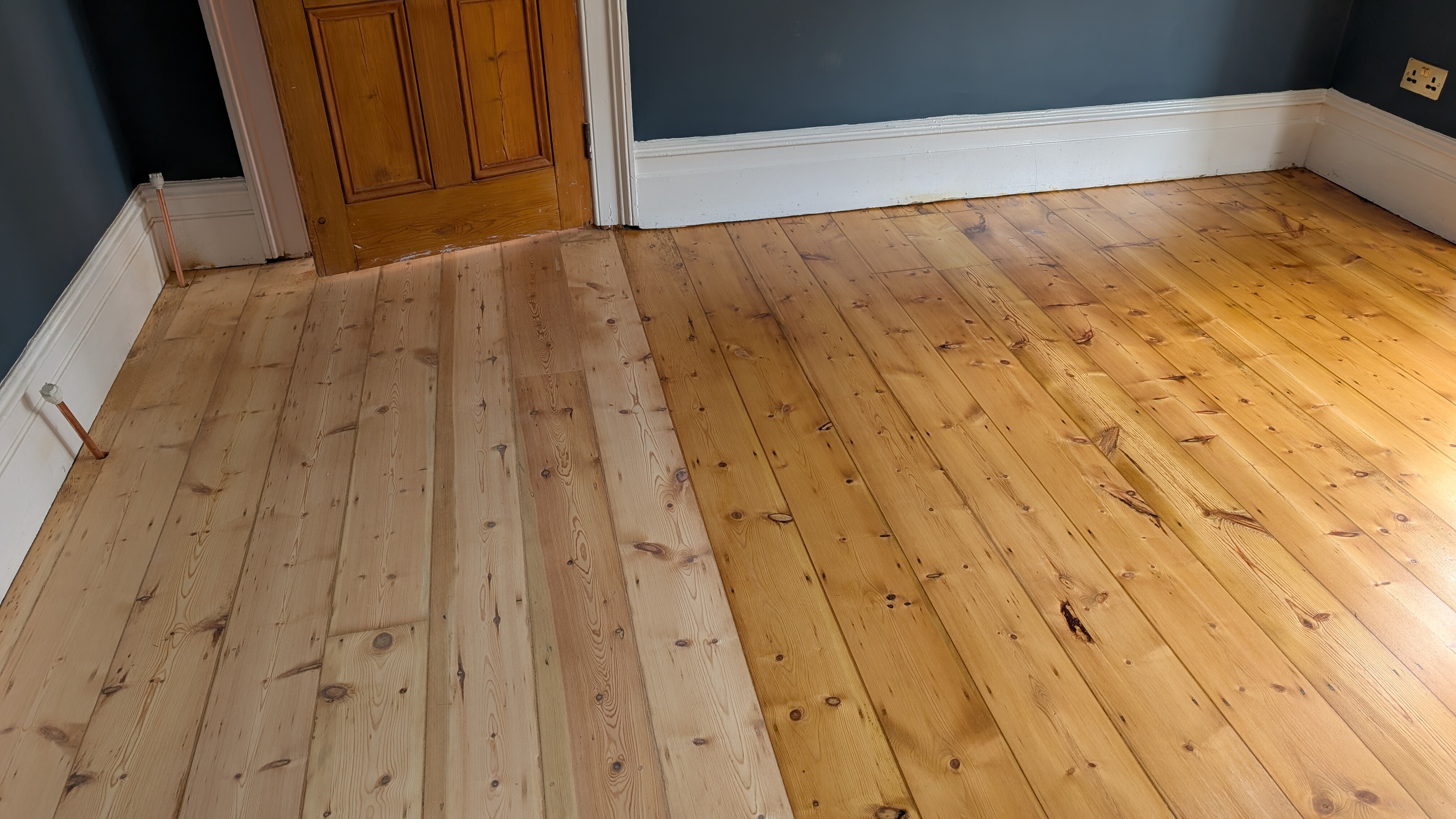 The process of the Restoration of Original Pine Floorboards - Watford