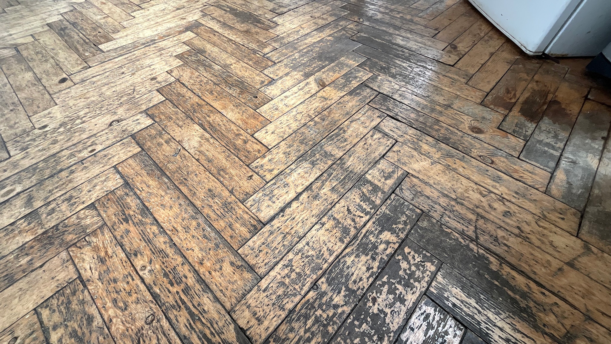 Worn & Scratched Parquet Flooring
