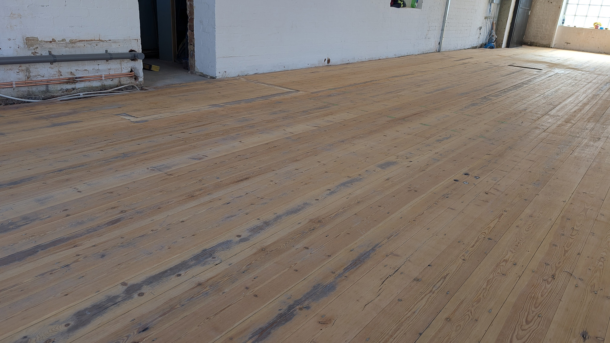 Pine Floorboards During Sanding