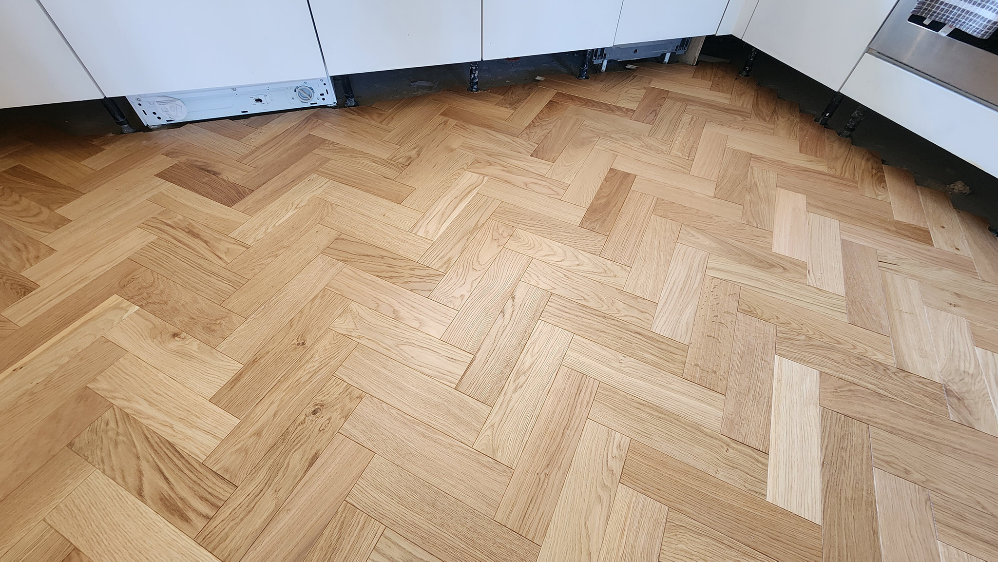 Installation of Timbercraft Herringbone Engineered Oak Parquet Flooring in Twickenham, TW1, TW4, TW13