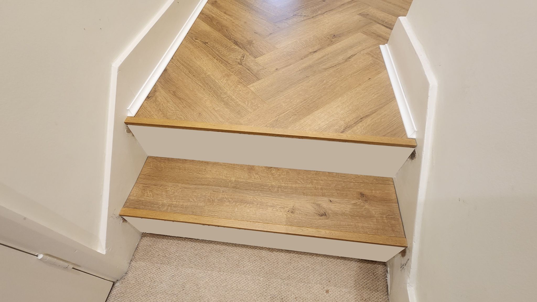 Finishing Herringbone Laminate Around Steps