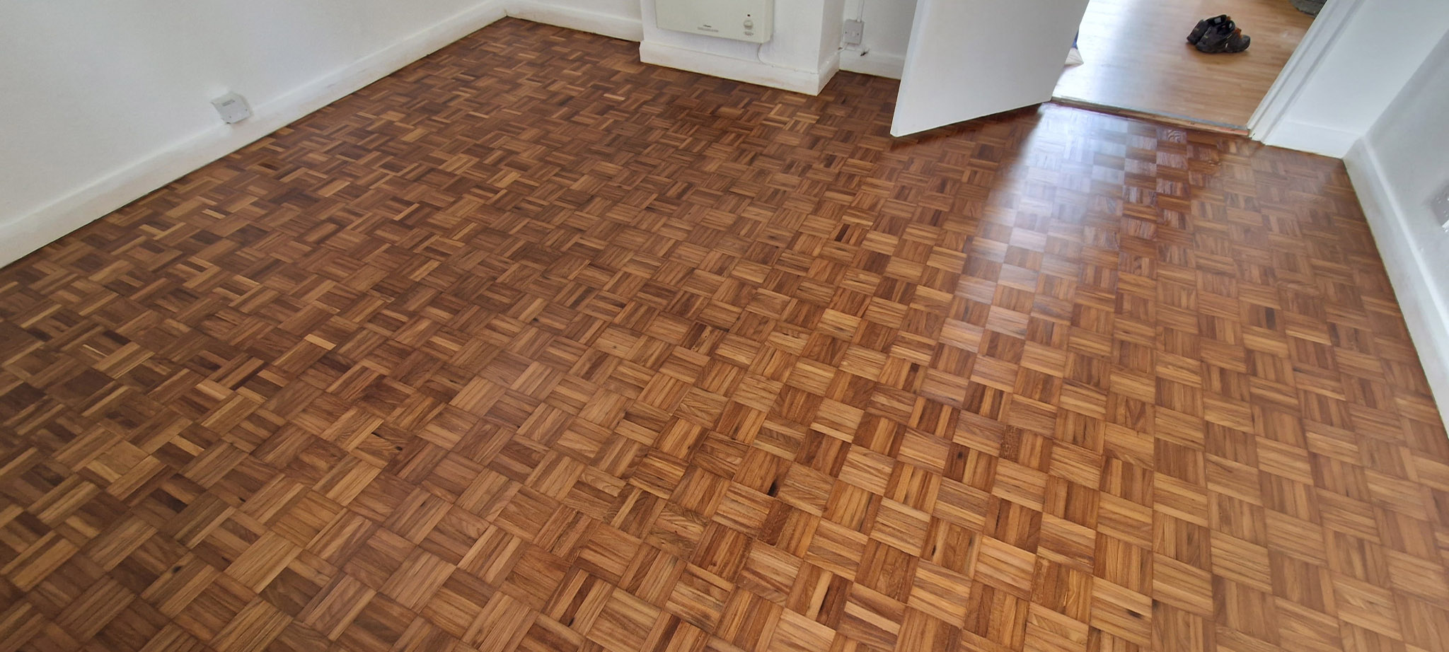 Restoration of Teak Parquet Flooring